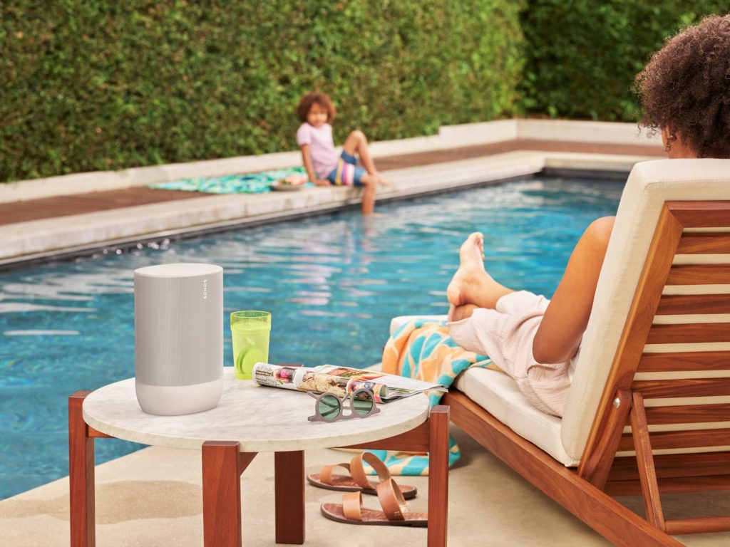 A Sonos Lunar White Move being enjoyed beside the pool
